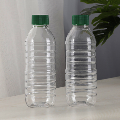 Custom 300ml  Empty Transparent Round Juice PET Plastic Drinking Bottles Spring Water Beverage Container with Lids