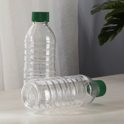 Custom 300ml  Empty Transparent Round Juice PET Plastic Drinking Bottles Spring Water Beverage Container with Lids